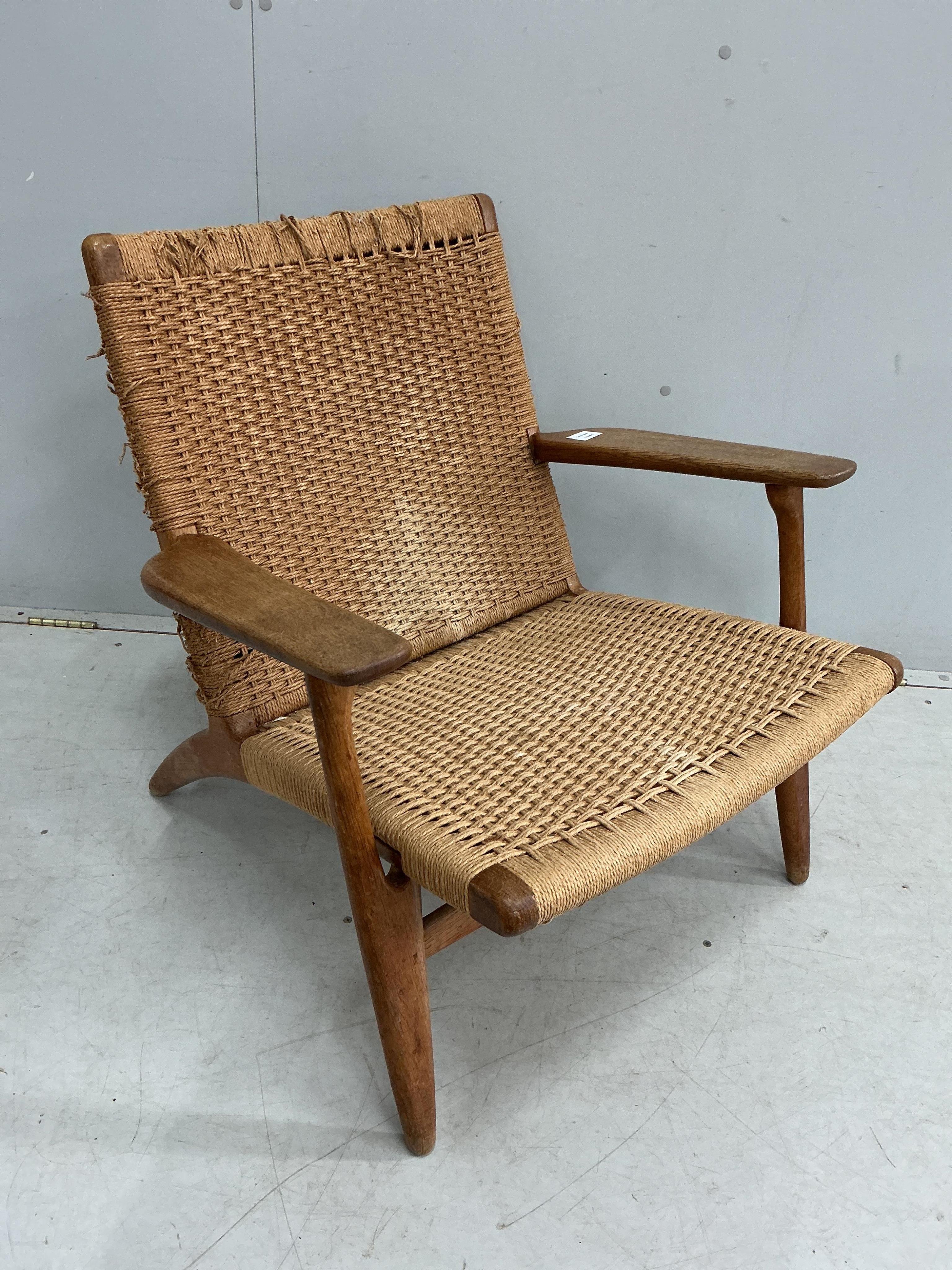 Hans Wegner for Carl Hansen and Son, an oak CH25 lounge chair, (a.f), width 71cm, depth 66cm, height 72cm